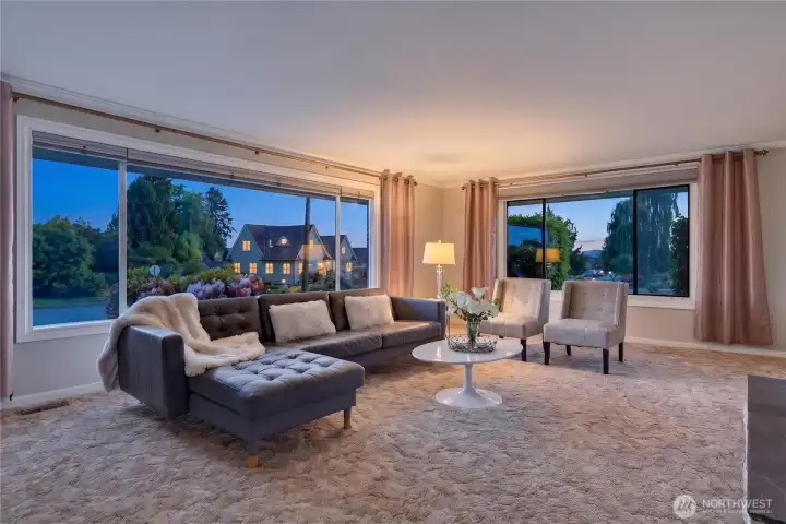 Main living room off the entry way with views of Rucker through the left windows and 9th through the right