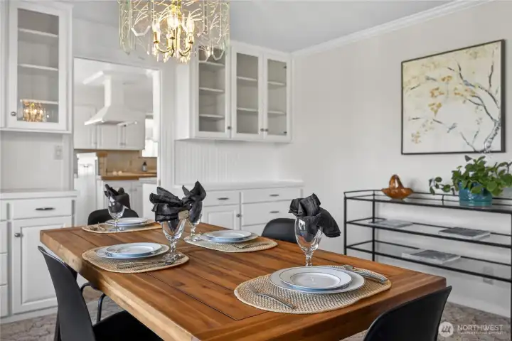 Formal dining room leading into breakfast nook