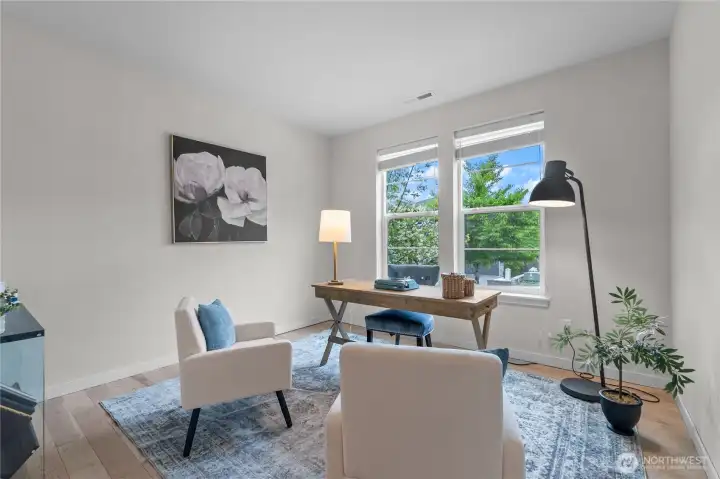The generous main floor bedroom is perfect as a home office.