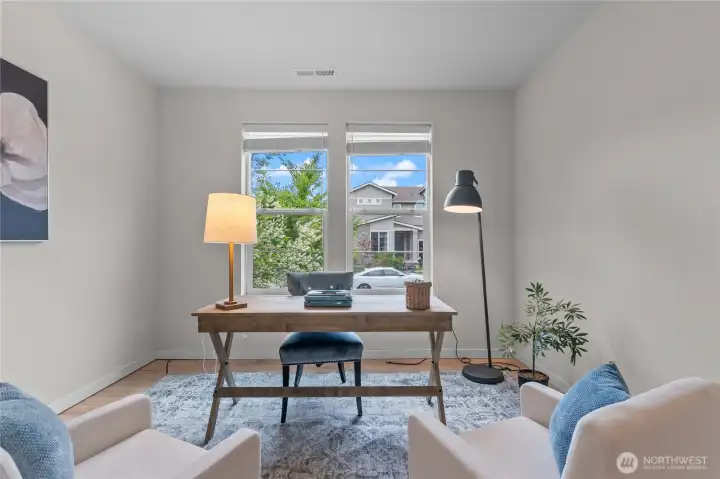 The generous main floor bedroom is perfect as a home office.