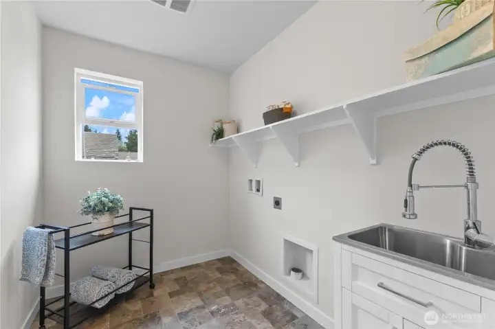 Upstairs laundry room.