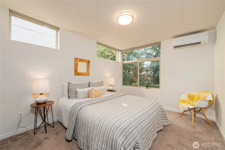 Second floor, east bedroom. Sellers added a mini-split so this room will stay nice and cool in the summer!