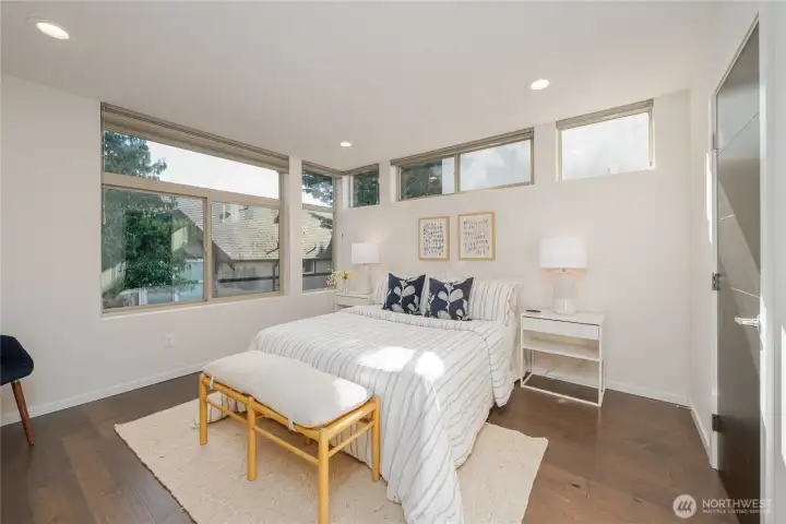 Third floor primary suite! Features hardwood floors, a walk-in closet, and a second closet.