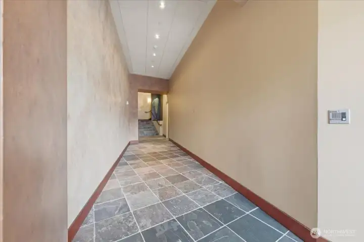 Entry Hall from Central Way - Elevator to Residences Entry Hall from Central Way - Elevator to Residences