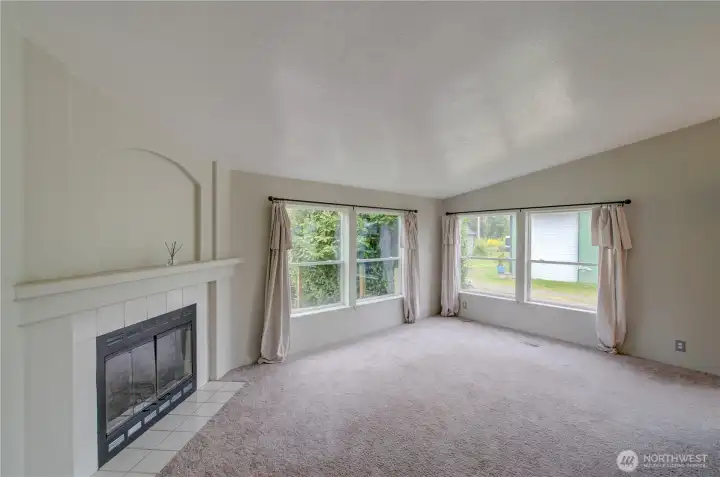 living room with wood fireplace