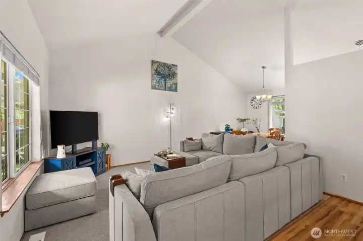 Vaulted ceilings fill this area with natural light.