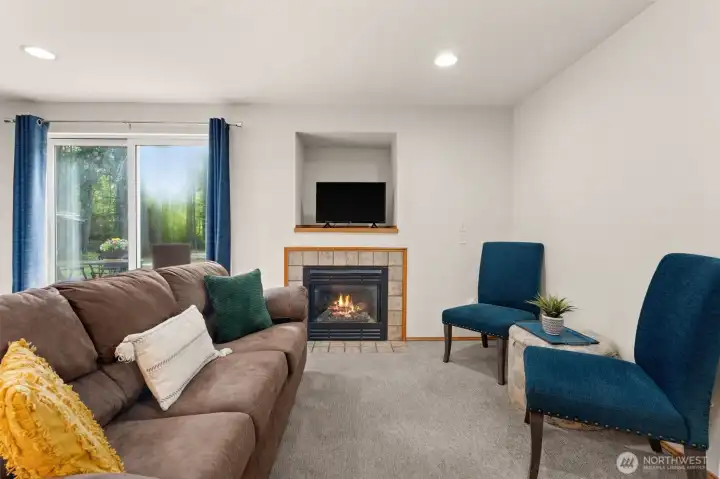 family room off kitchen with gas fireplace.