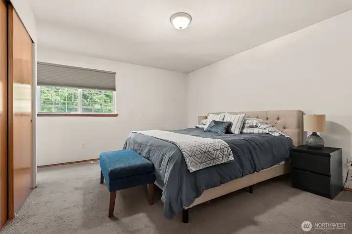 Primary upstairs. Plenty of room for king bed.