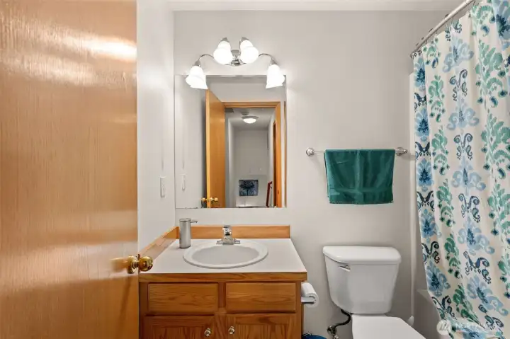 Full bath off the hall.