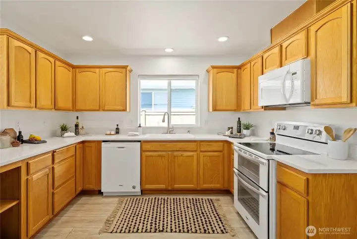 Thoughtfully designed kitchen with generous workspace and abundant cabinetry.