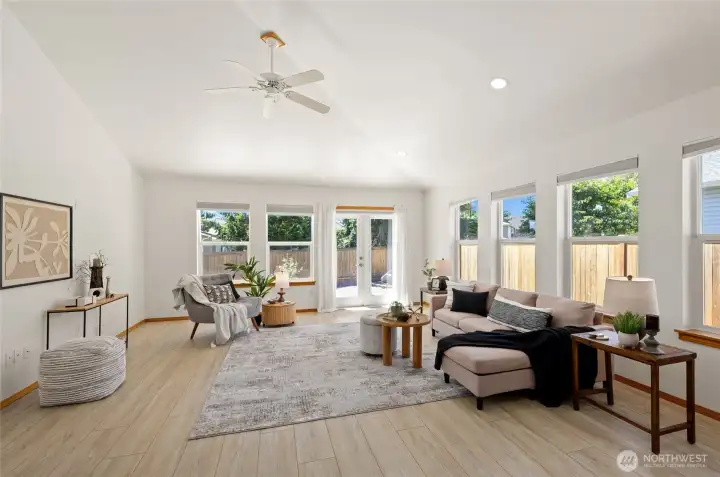 Vaulted ceilings and expansive living spaces create an inviting sense of openness.