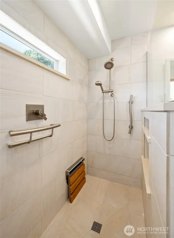 Custom tiled walk-in shower with thoughtful design and spa-inspired comfort.