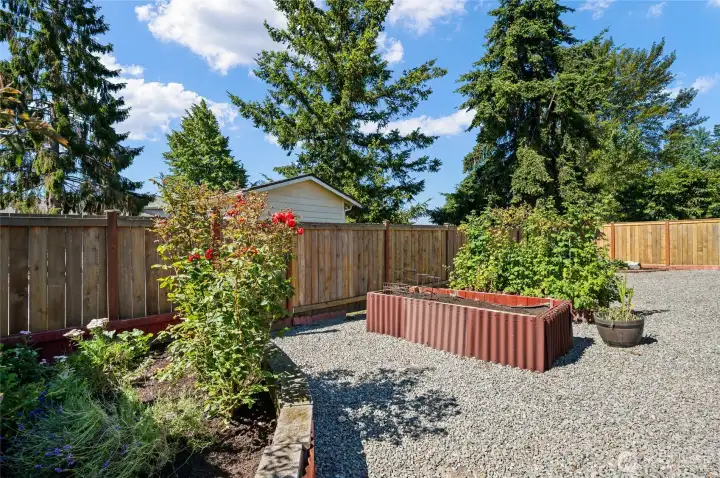 Raised garden beds create the perfect setting for homegrown vegetables, herbs, and flowers.