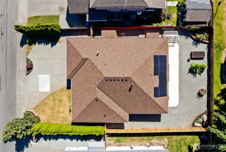 An overhead perspective showcases the thoughtfully designed outdoor spaces and backyard.
