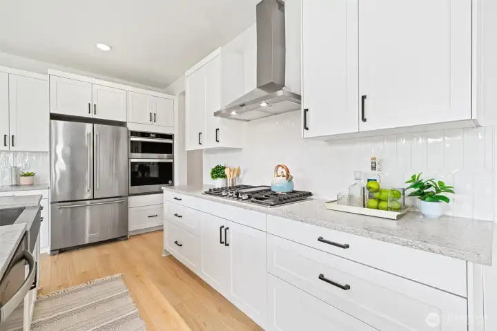 Soft close cabinets and drawers, upgraded hood vent and gas range