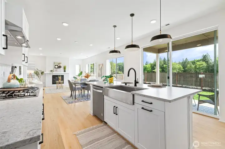 Apron front Farmhouse Kitchen sink and modern pendant lighting