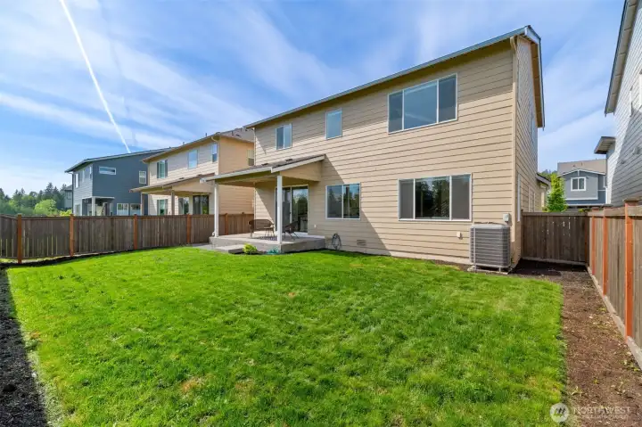 Spacious level and fully fenced yard