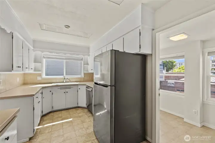 Mudroom is to the back of the kitchen. All appliances stay.