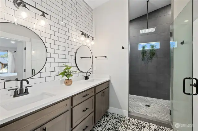 Lots of storage in this vanity.  Check out that rainhead in the shower!