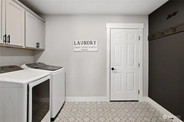 Laundry room off of the garage.