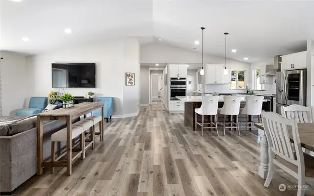 Open concept living provided with 4 bedrooms, 2.25 bathrooms, laundry room and an added bonus of a large butler's kitchen to supplement the kitchen space.