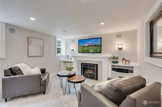 Downstairs rec room with yet another gas fireplace