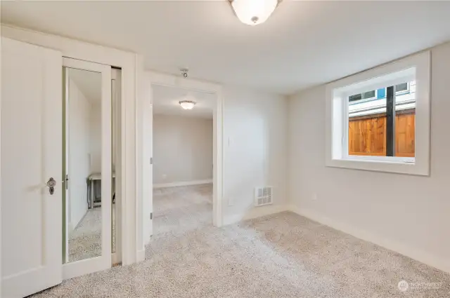 2nd basement bedroom that connects to the other bedroom.