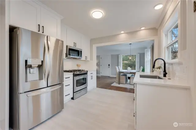 Kitchen now opens up to the dining room so you have more space for all to gather...and you know this is where all will do just that!