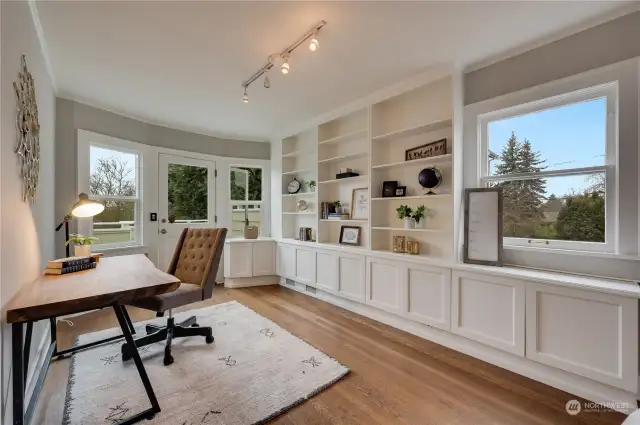 Office on main floor (now an essential of modern living) with built-ins and access to the back deck and yard.