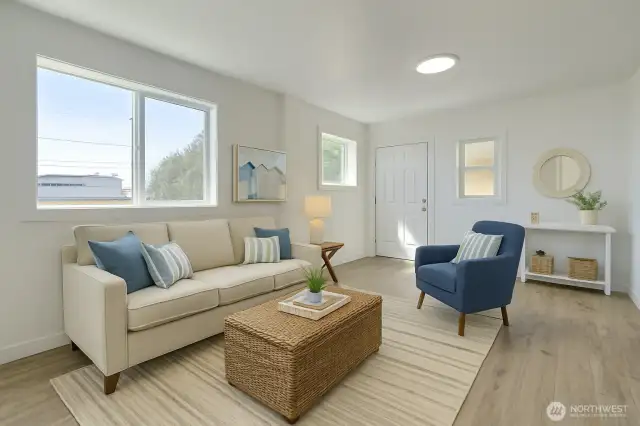 Lower unit front living room. Virtually staged.