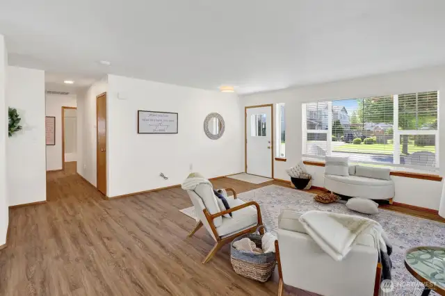 The view down the hallway to the 3 bedrooms & laundry.