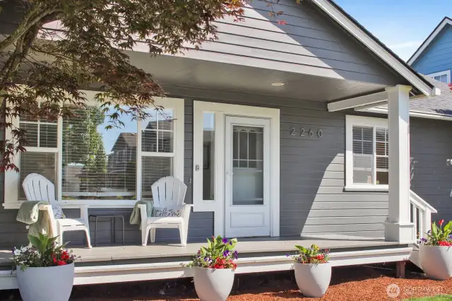 Fresh renovations inside and out! For starters check out this porch!
