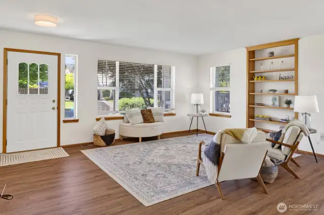 Notable interior enhancements include new luxury vinyl laminate flooring, updated lighting fixtures, fresh interior paint...