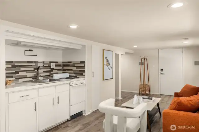 ADU comes complete with vinyl flooring, oven, refrigerator and a sink.