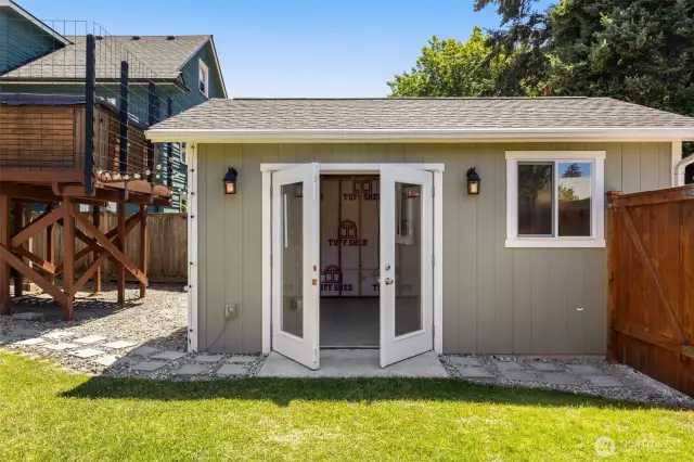 Newly installed fenced-in landscaped yard.
