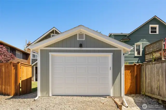 New garage fully permitted and EV ready. Ideally situated off of an alley.
