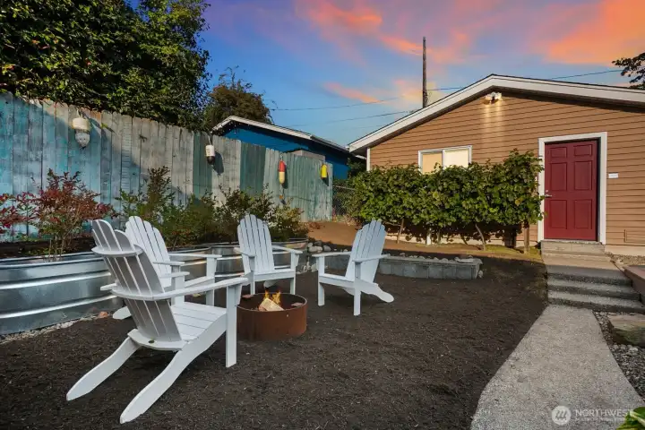 The backyard firepit creates one of three inviting spots to gather—perfect for evenings with friends or quiet moments with someone special.
