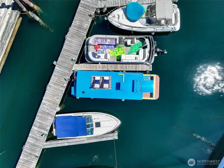 From above, the S.S. Guppy’s vibrant profile stands out in its secure Westlake slip, part of a friendly, gated marina on Lake Union.