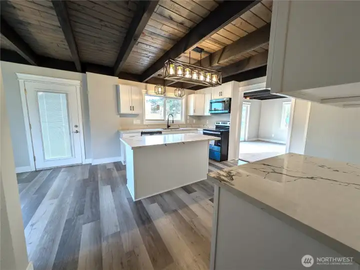 Door leads to giant back yard & patio/deck.