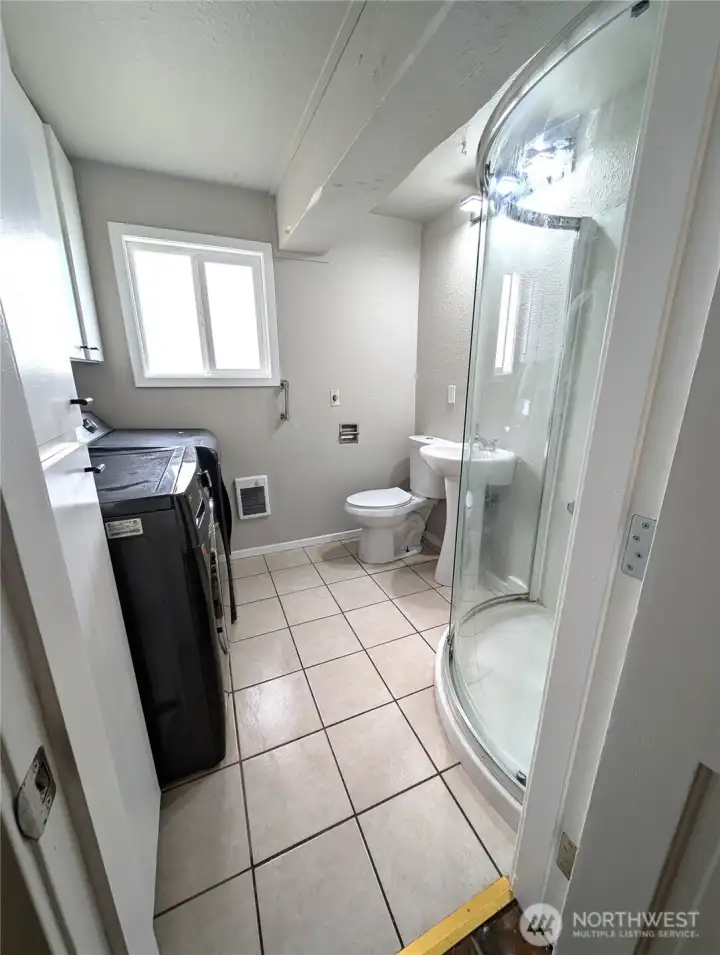 3/4 bath on main w/utility room & cabinets.