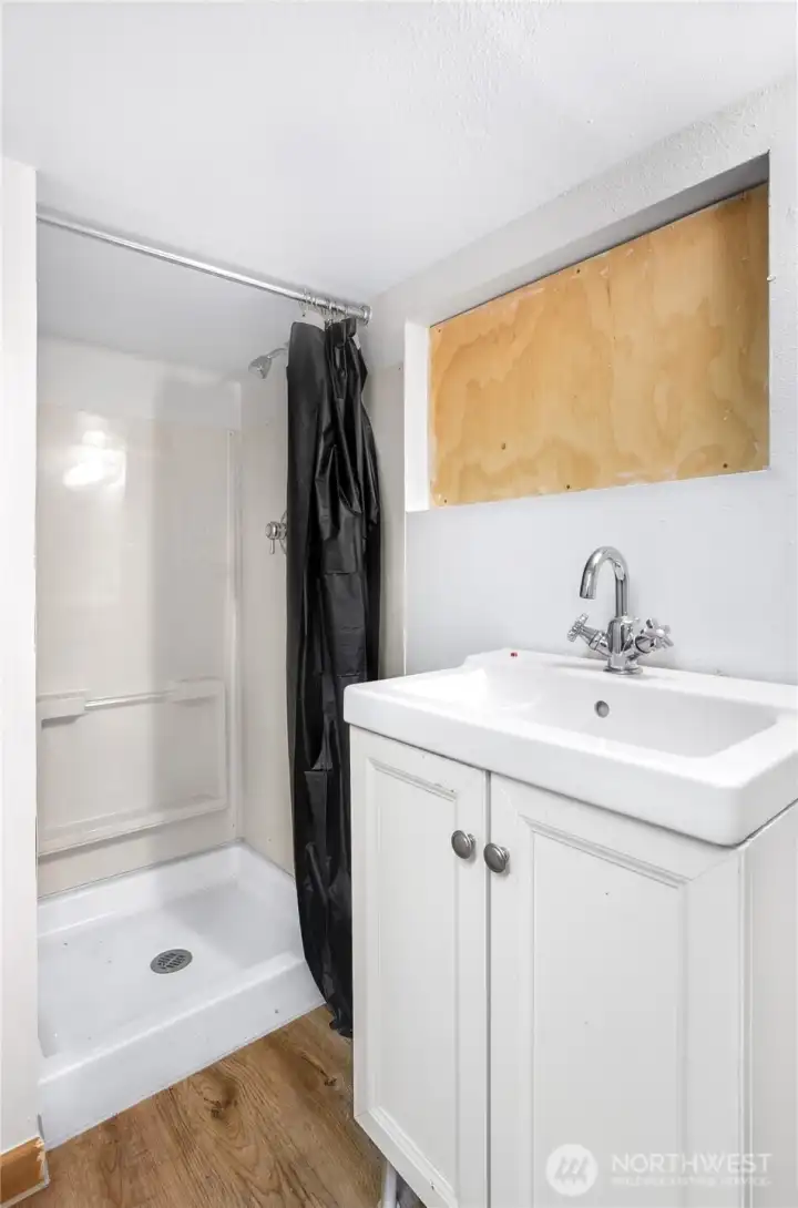 Fully finished basement includes a convenient three-quarter bathroom.