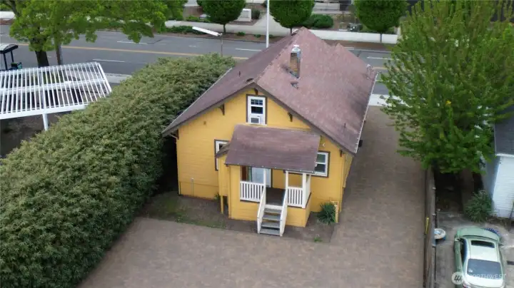 Versatile live/work property with private entry, strong visibility, and ample parking for clients or guests.