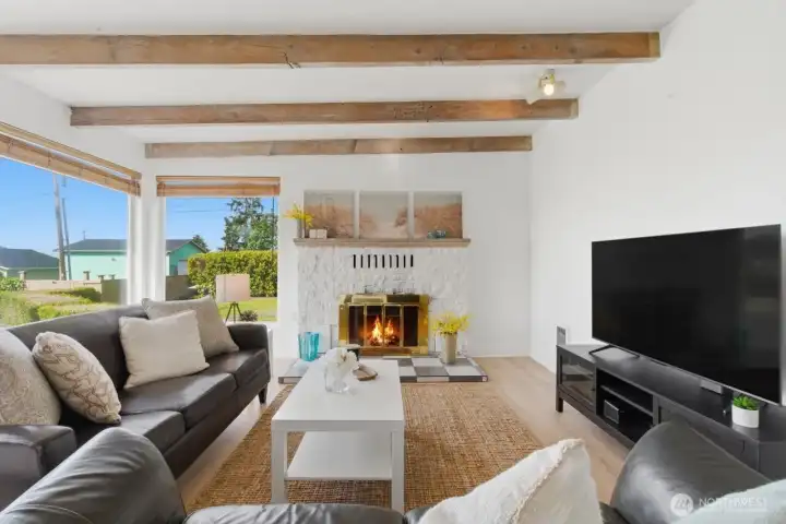 Brick fireplace in this comfy living room