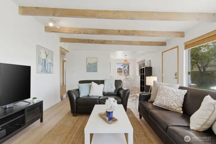 Spacious living room open to dining area