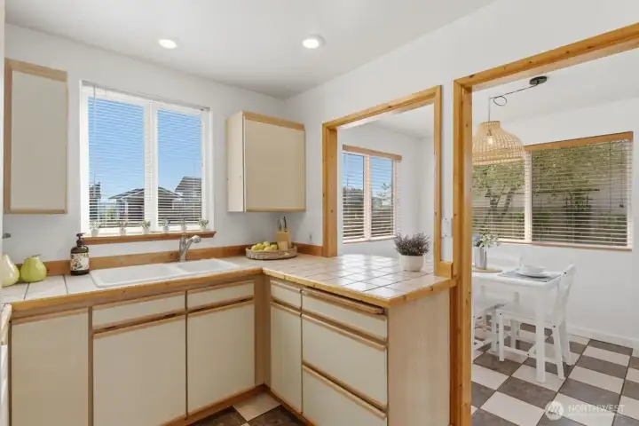 Ample counter top space in this cozy kitchen