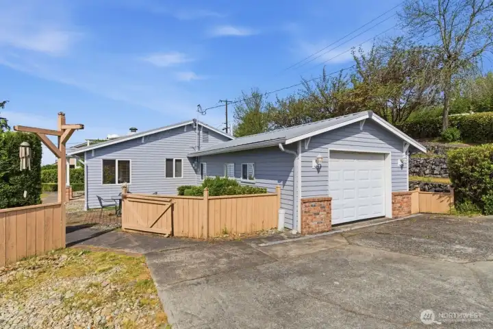 Access off 112th road behind the house with plenty of off street parking. Fully fenced yard