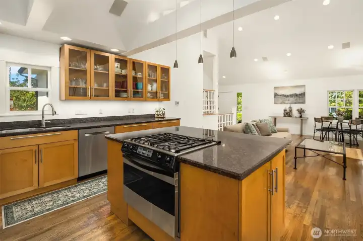 A social layout with the range top facing the breakfast bar & living spaces keeps the cook connected.