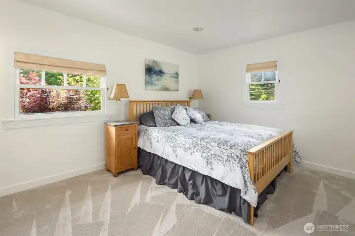 Spacious primary bedroom, also upstairs.