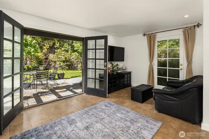 The lower rec room's French doors open directly to the patio.