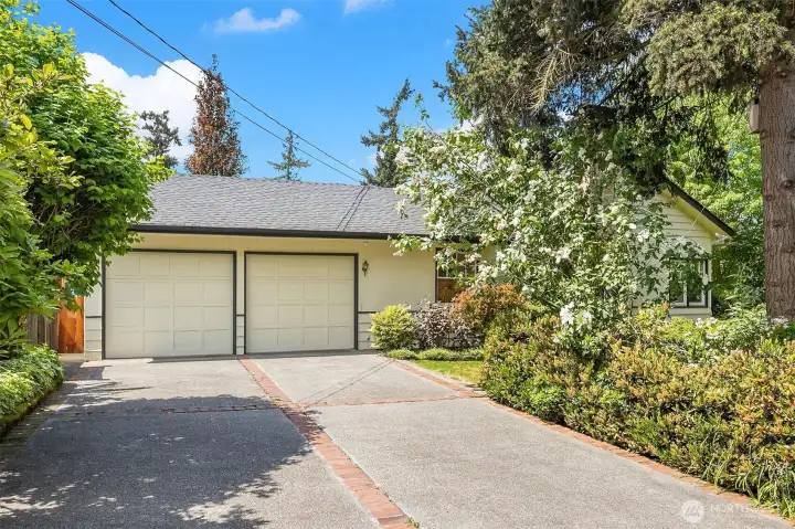 2-car attached garage plus generous driveway parking.